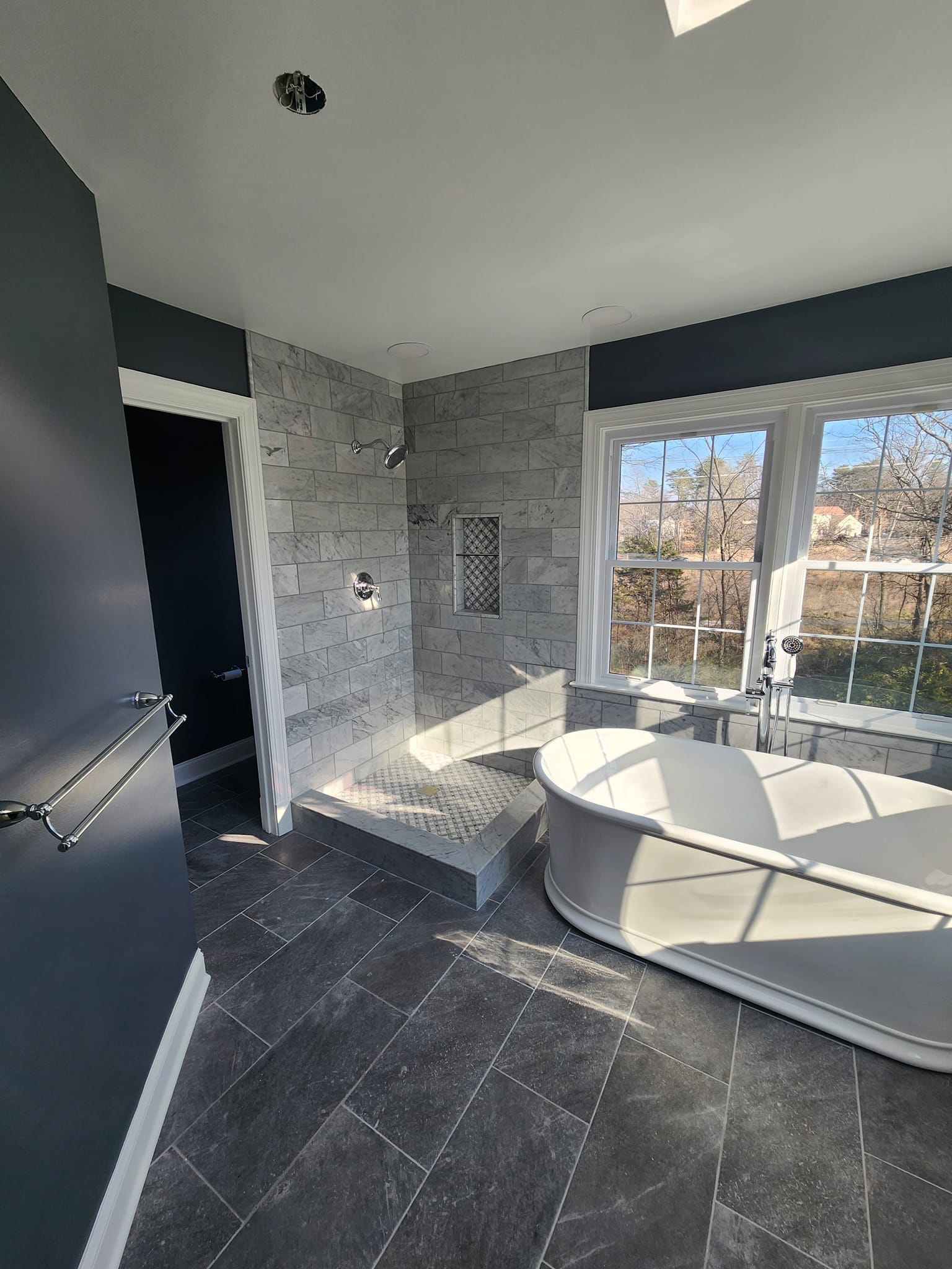Marble shower and soaking tub