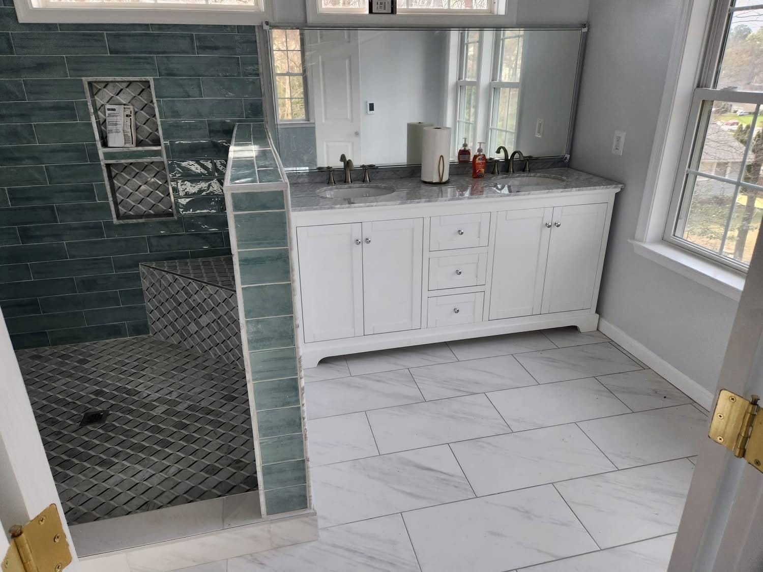 Renovated bathroom by Skip's Modern Carpentry